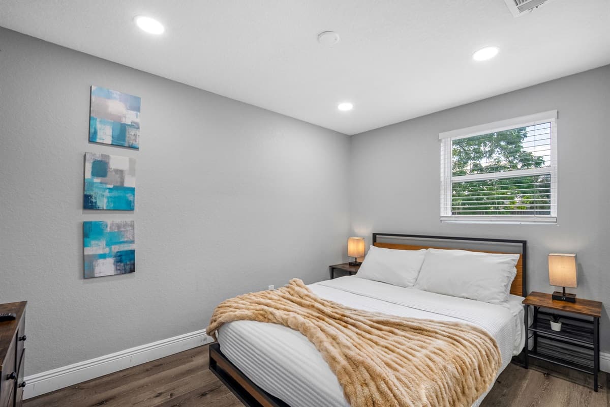 Clean lines and soft lighting create a peaceful, modern retreat perfect for restful nights.