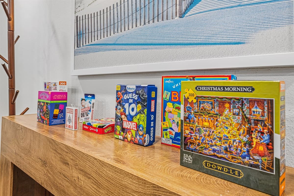 Family-friendly game selection available for guests—great for fun nights in 
Games shown are for guest use; arrangement may vary.