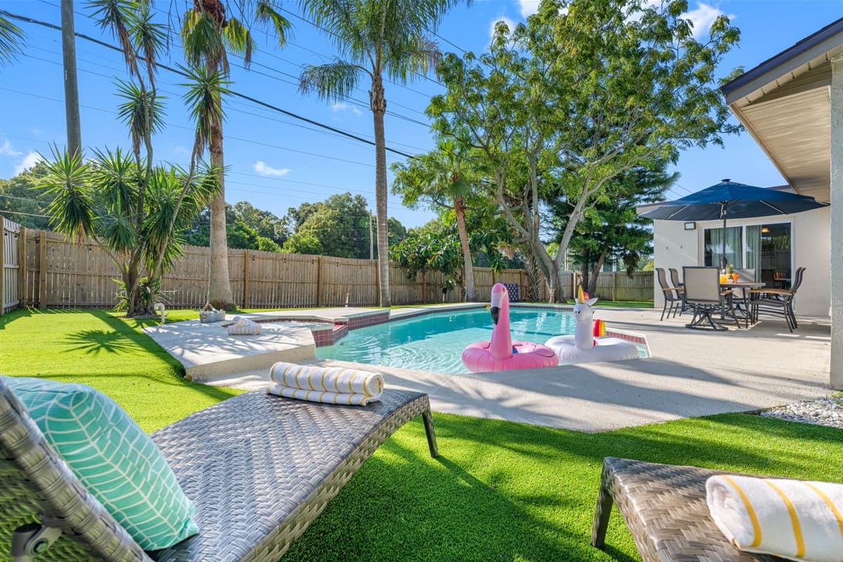 Around the pool, you'll find a spacious deck equipped with comfortable lounge chairs, perfect for soaking up the sun or enjoying a good book.