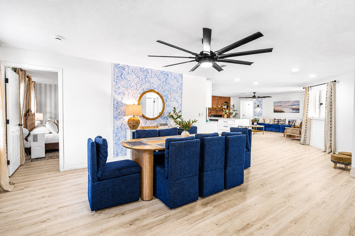 From here you can see the table, the kitchen, and the living room at once. The house never feels split up.
