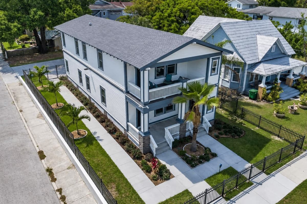 Incredible aerial front view of the house showcasing our beautiful front yard with trees and cute plants. If you are interested in this property, don't hesitate to send us an inquiry as soon as possible!