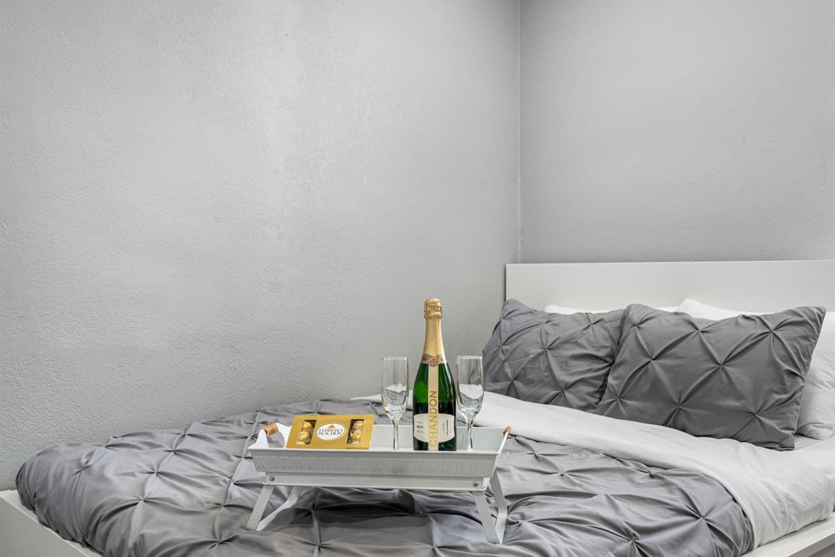 Soft lighting, high-quality linens, and carefully chosen furnishings create a serene atmosphere perfect for unwinding after a long day.