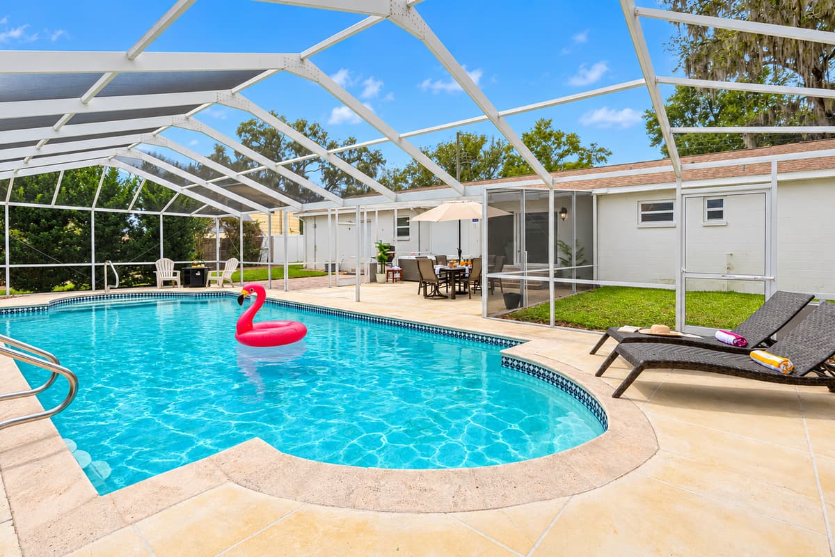 Relax in this private screened-in pool, perfect for sunny Florida days and peaceful evenings.