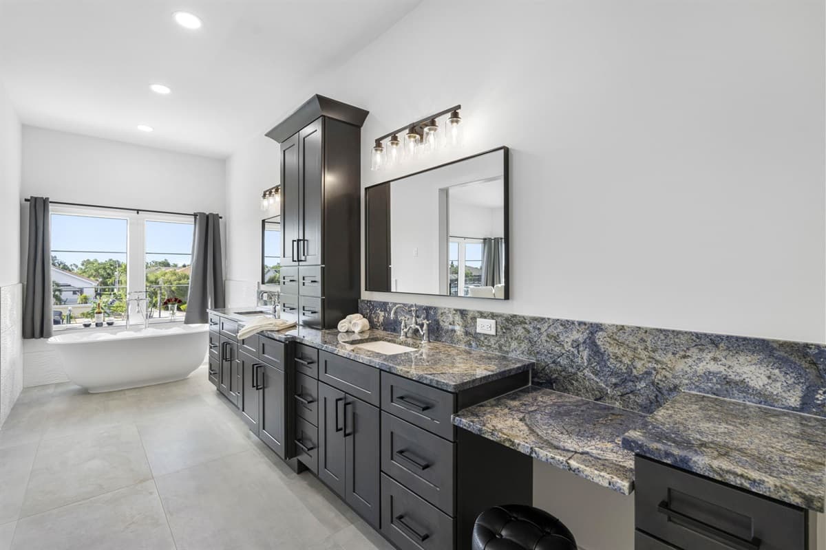 This bathroom ensures a spa-like experience, combining comfort and style for a truly relaxing escape.