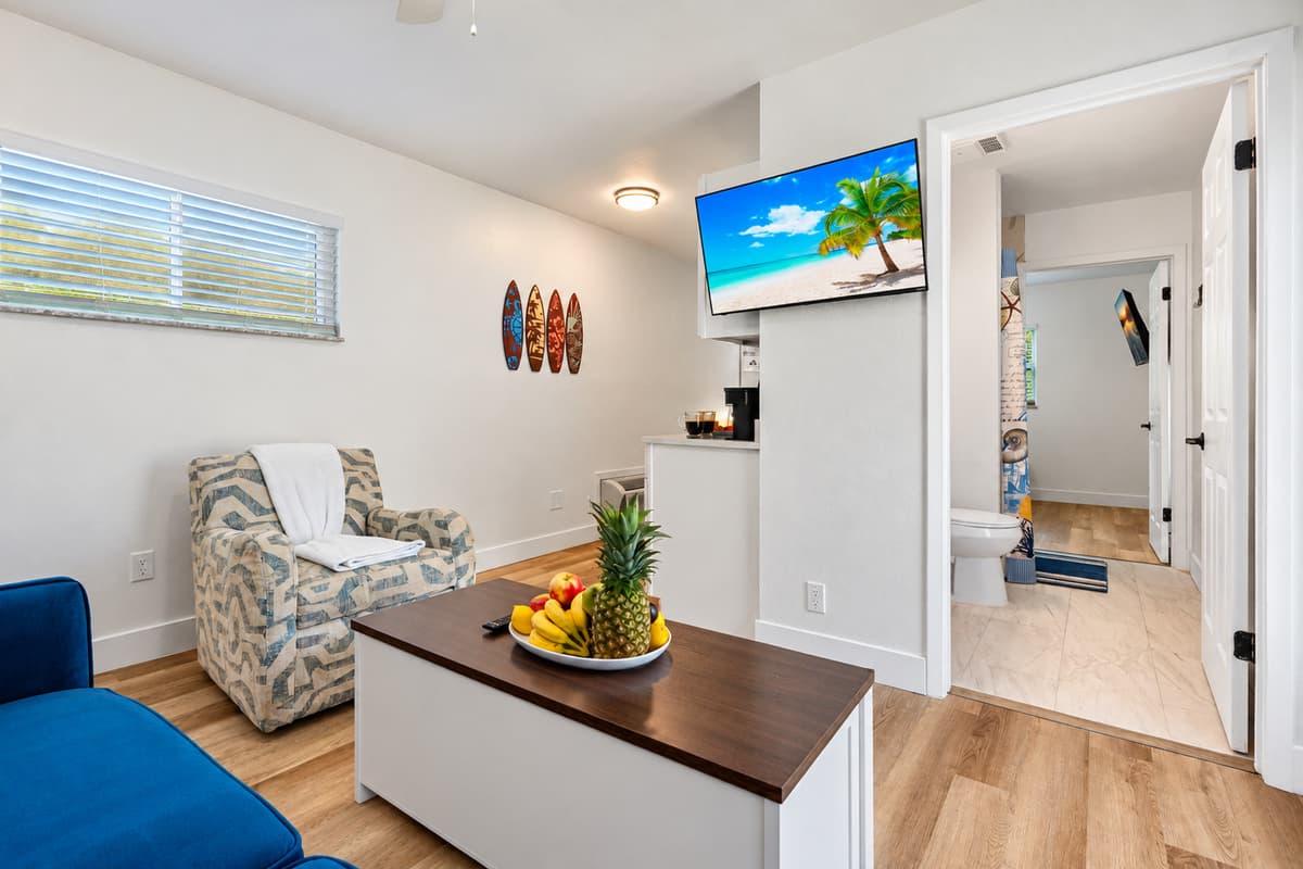 Your peaceful retreat awaits! This cozy suite features its own living space, sleeping nook, and kitchenette—all in a bright, modern design.