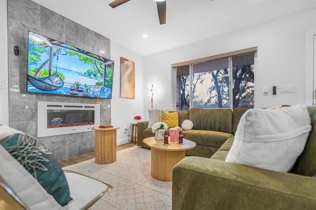 A cozy yet modern living space where plush seating, neutral tones, and clean lines come together to create the perfect place to unwind.