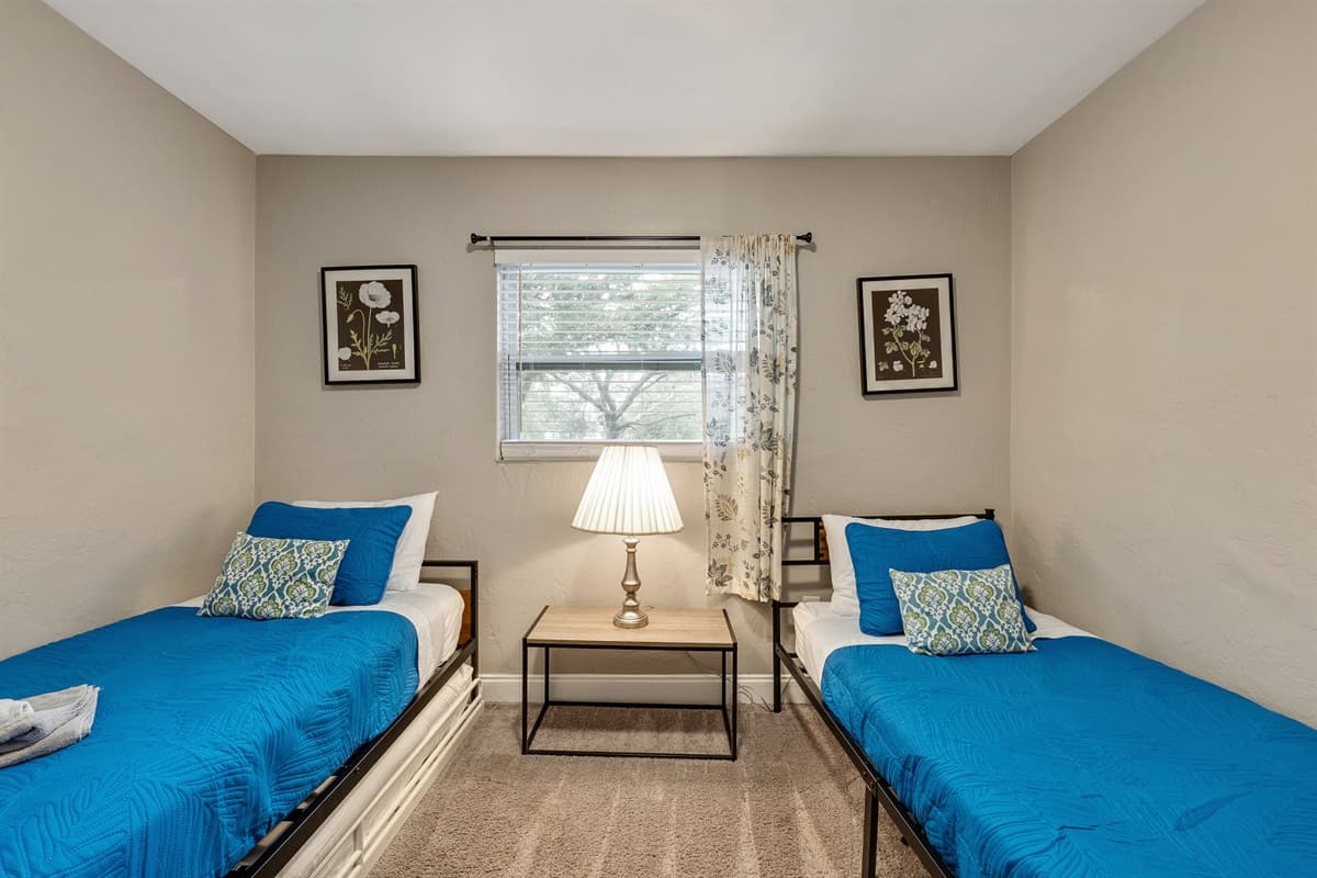 As natural light cascades through the windows, the room comes alive, inviting you to unwind and bask in the allure of this intimate space.