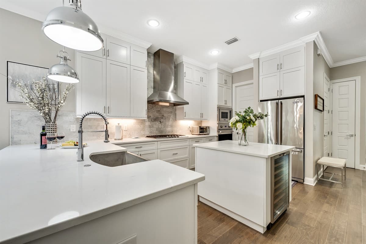 The space flows effortlessly into the adjacent dining and living areas, allowing for easy interaction and connection.