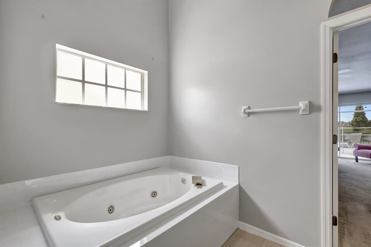 Embrace the peacefulness of this exquisite bathroom, where relaxation and rejuvenation intertwine to create a truly indulgent retreat.