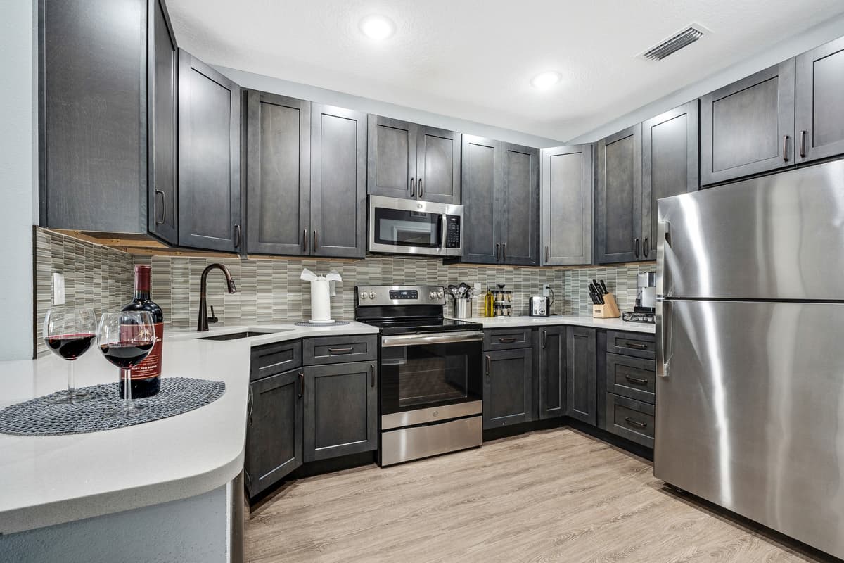 Designed with both aesthetics and practicality in mind, this kitchen invites you to explore the art of cooking with ease.
