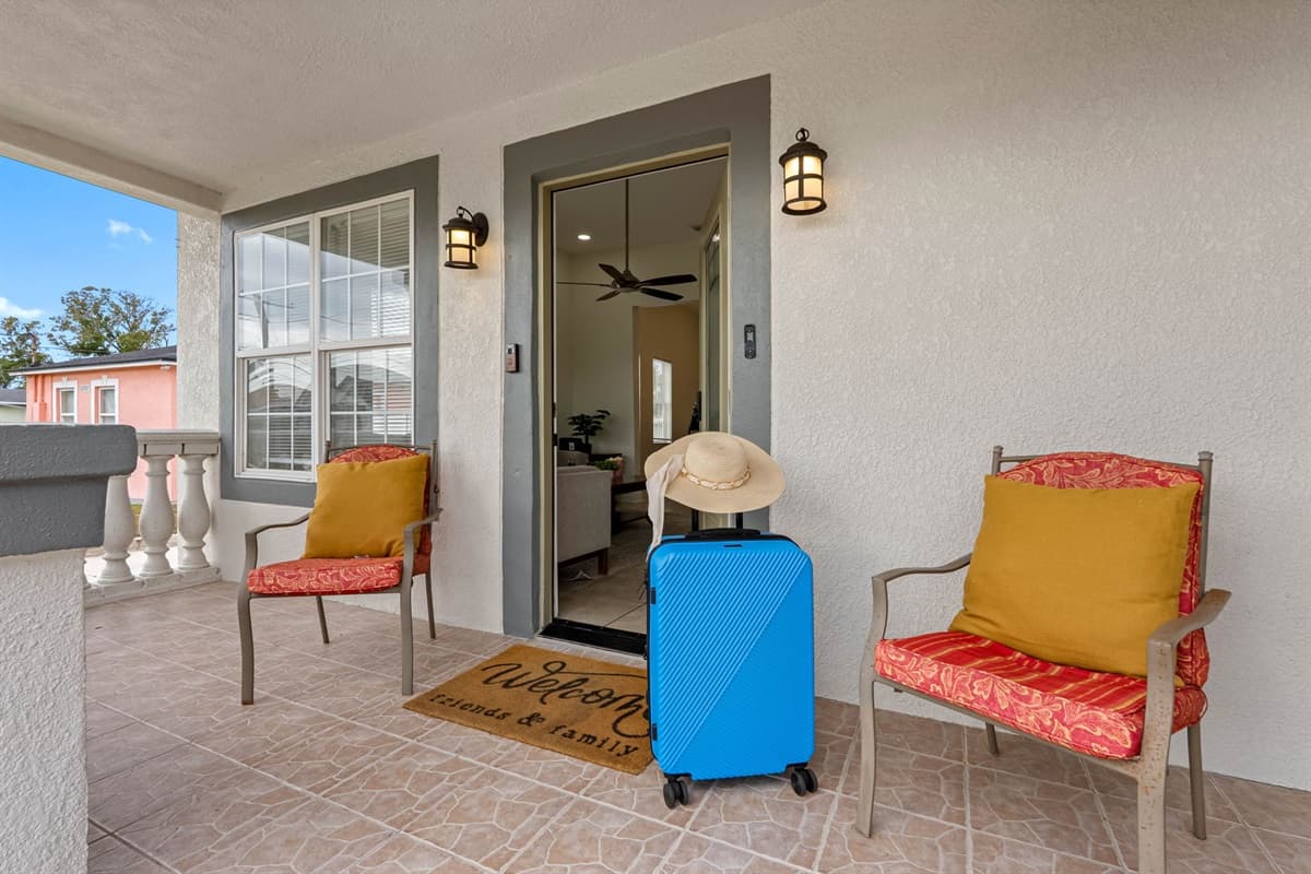 Enjoy quiet moments on the covered front porch, complete with plush chairs and soft lighting—great for evening conversations or enjoying a cool breeze.