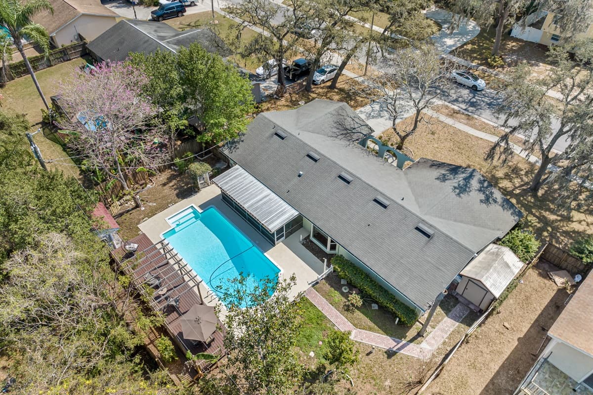 The majestic beauty of the house and the pool combine to create a breathtaking panorama.