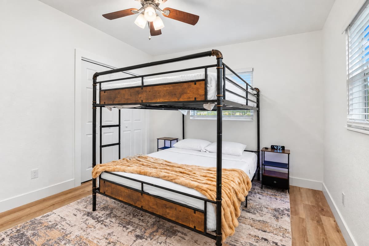 Fun meets function in this stylish bunk room—ideal for siblings, cousins, or guests looking to share a space without sacrificing comfort.