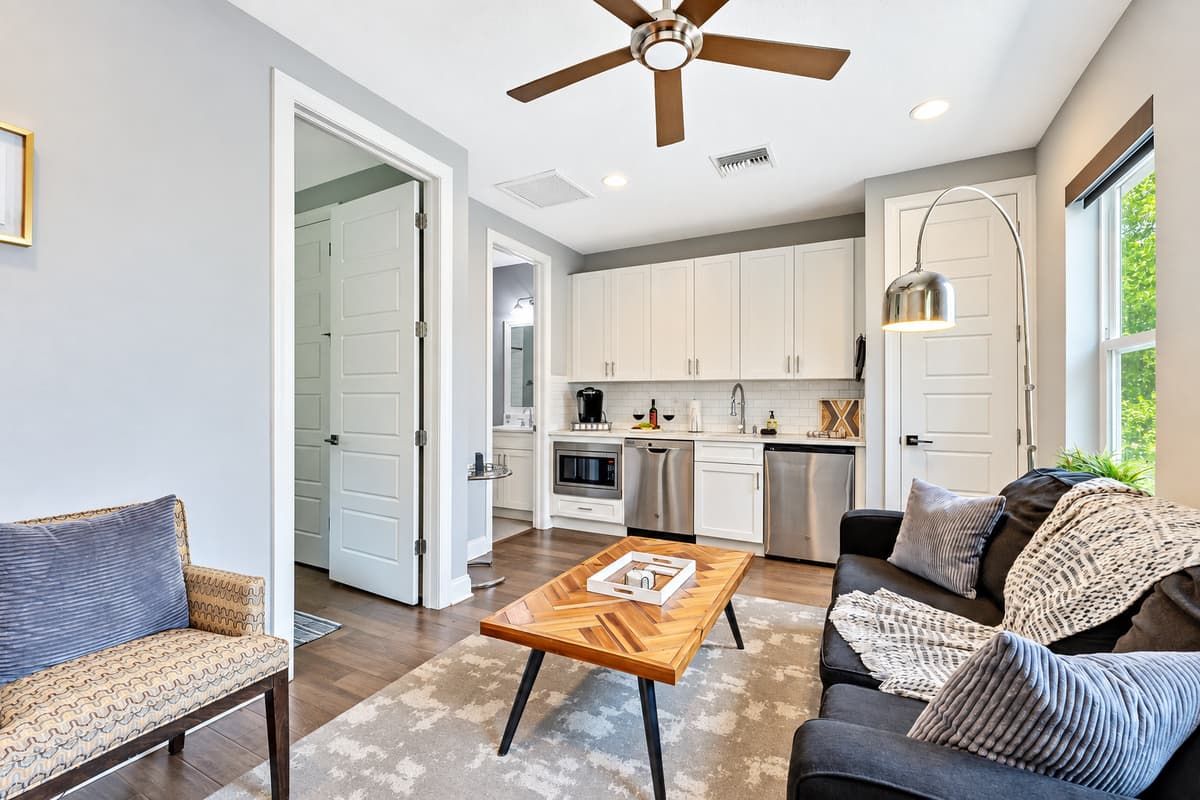 The open-concept layout seamlessly connects the second Living Room with the adjacent kitchen