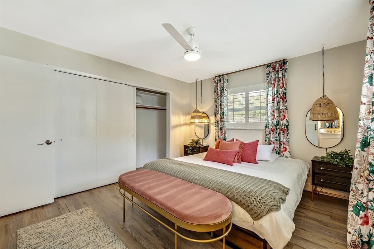 Adjacent to the sleeping area, the ensuite bathroom offers a private retreat of luxury and convenience.