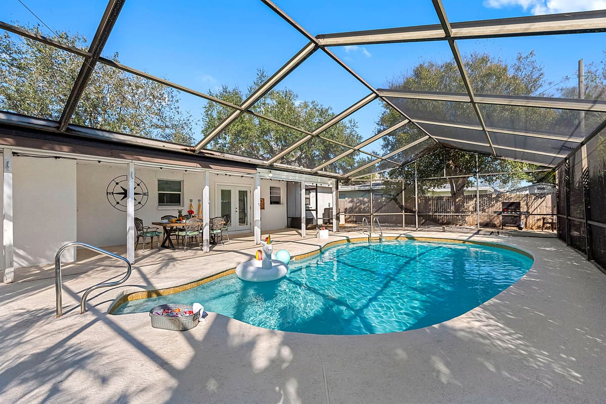 The poolside area is spacious, allowing plenty of room to move around, sunbathe, or simply lounge at your leisure.