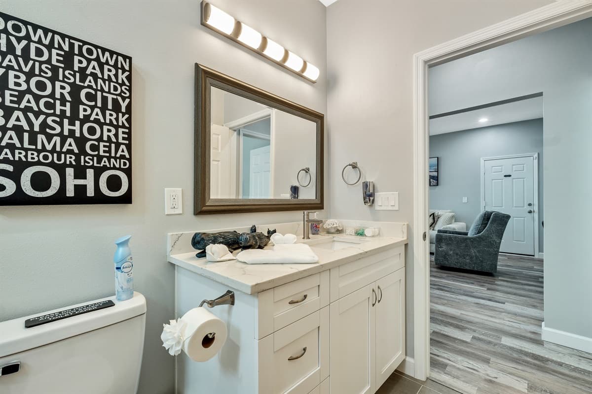 Delicate tiles, quaint fixtures, and soft lighting create a warm and inviting ambiance.