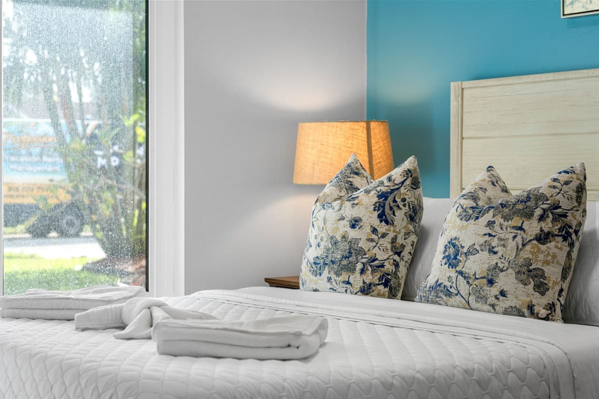 A charming queen-size bedroom that strikes the perfect balance between comfort and style.