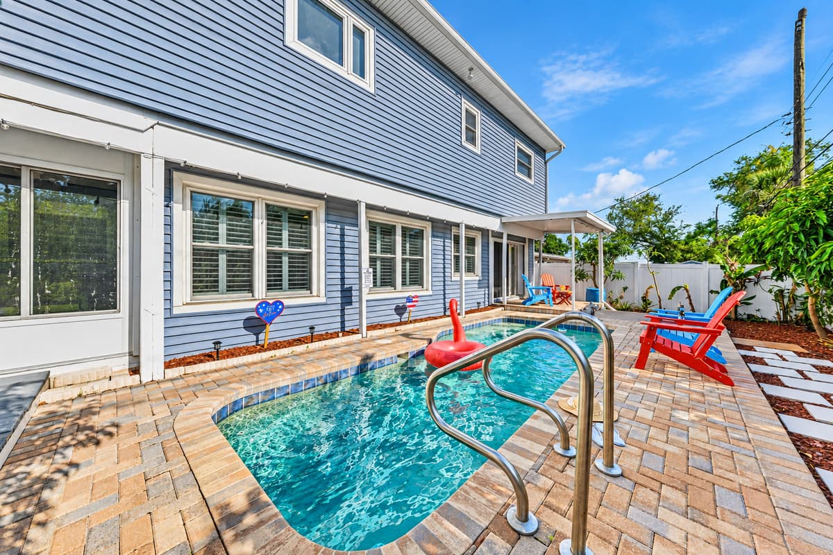 Backyard view showcasing the pool and home exterior—spacious, clean, and beautifully maintained 