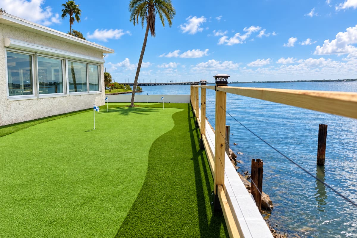 Private putting green beside the waterfront.