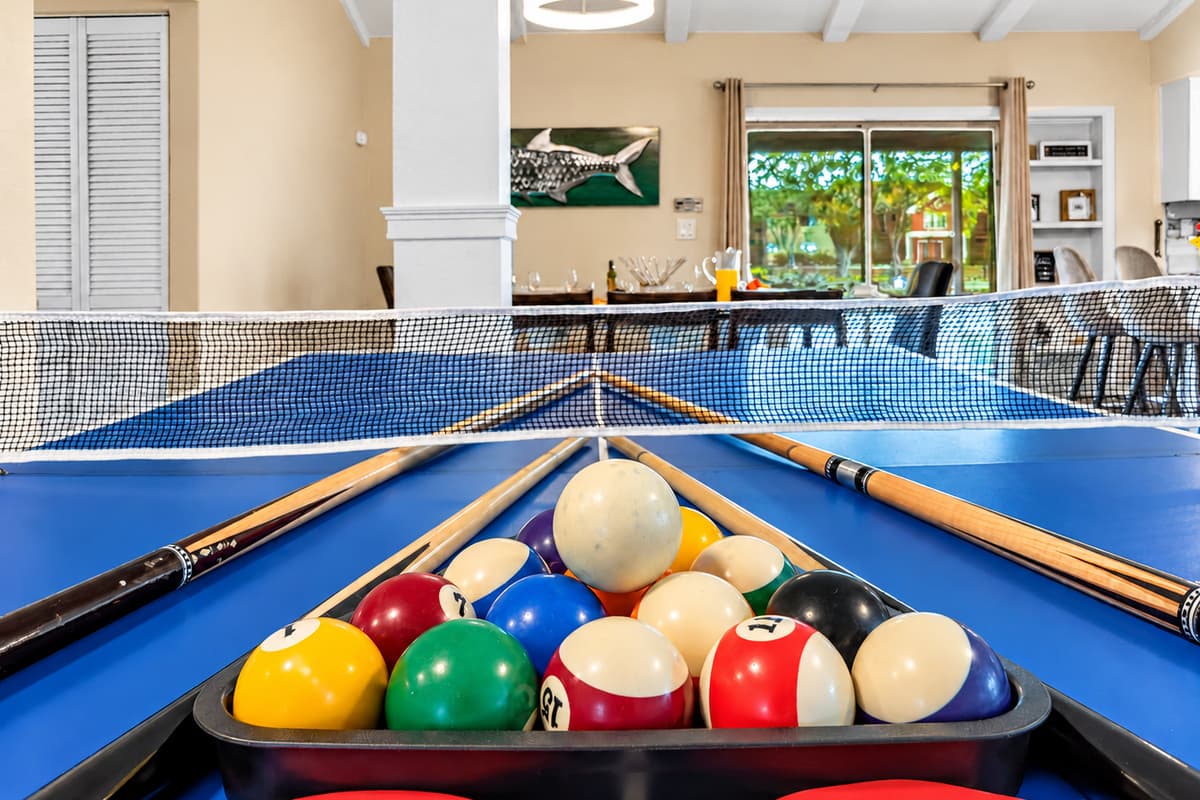 Pool table and open-concept layout create the perfect setting for memorable group getaways.