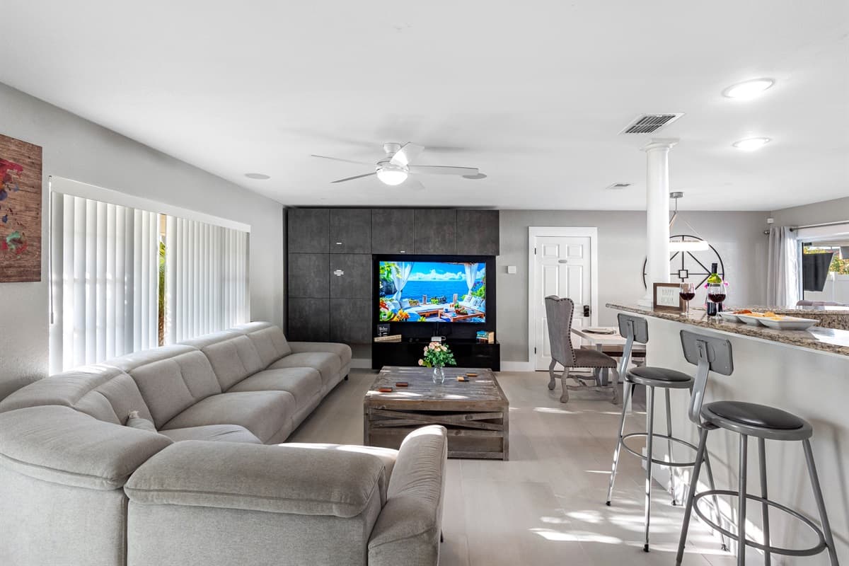 Showcasing a cozy, contemporary sofa that creates the perfect setting for creating cherished memories with loved ones in our welcoming living space.