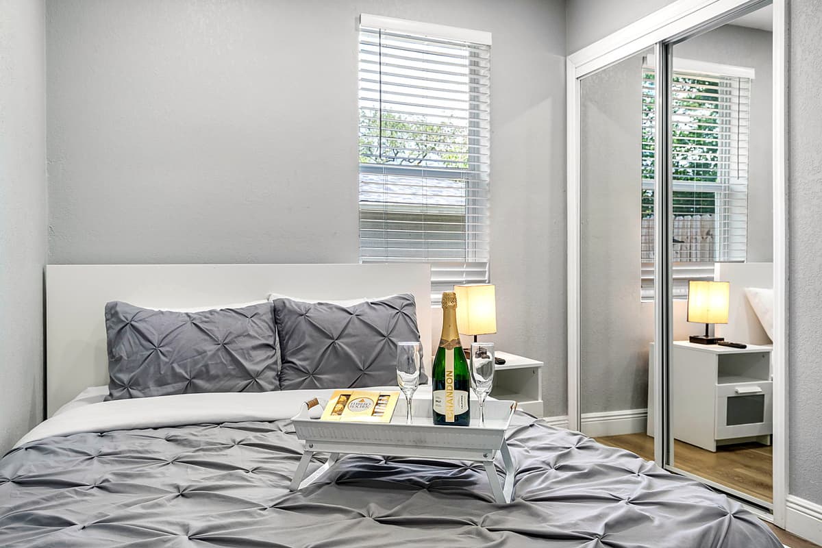Adorned with a plush queen-size bed, it promises restful slumber and rejuvenation.