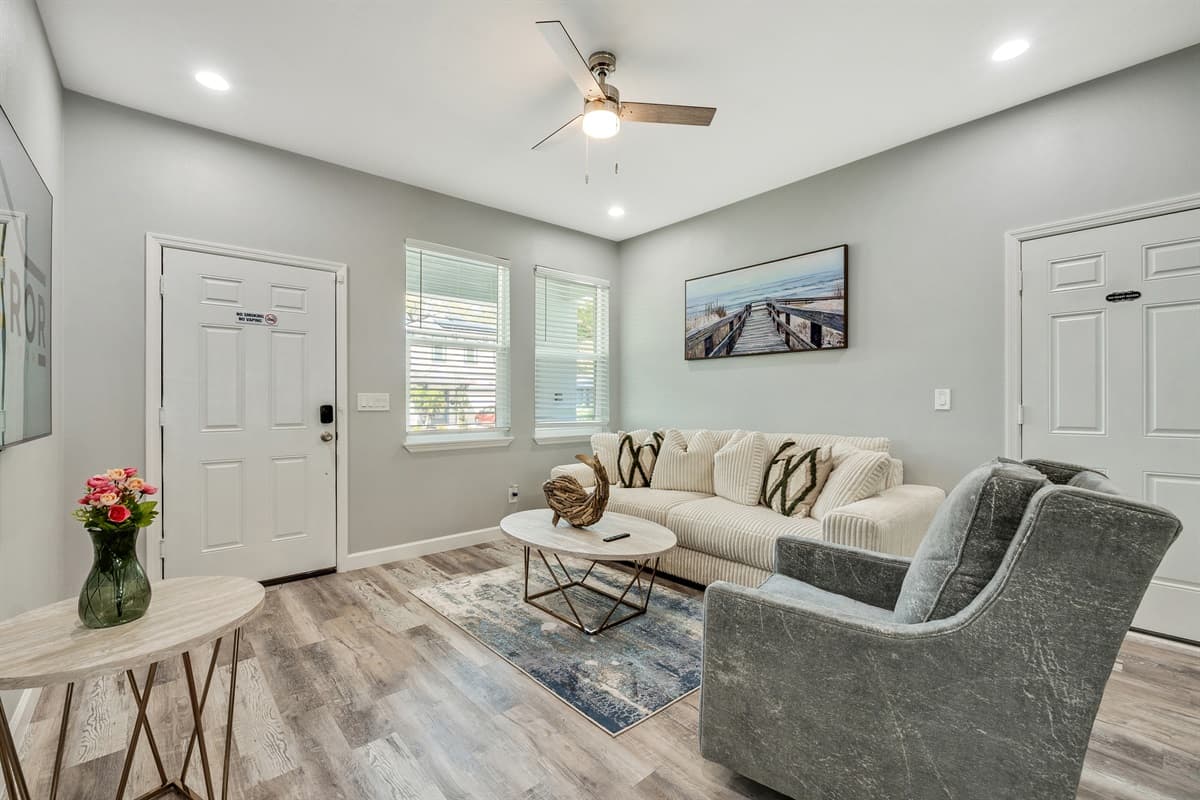 Soft, neutral tones and tasteful decor create a serene atmosphere, while luxurious textiles and tactile finishes add warmth and sophistication to the space.