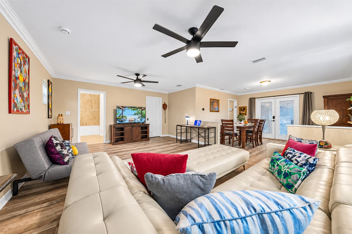 Expansive living area with ample seating, open layout, and modern finishes—great for groups and families.