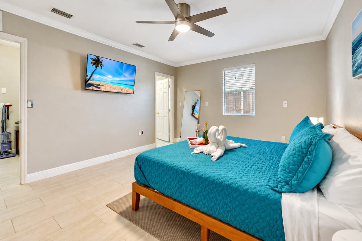 The king bed takes center stage, offering a regal and expansive sleeping space for unparalleled comfort.