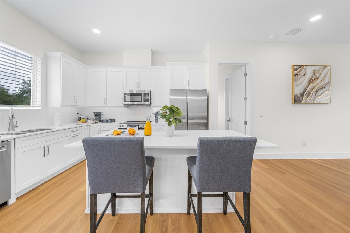 Spacious kitchen island with seating—perfect for casual dining or gathering while cooking.