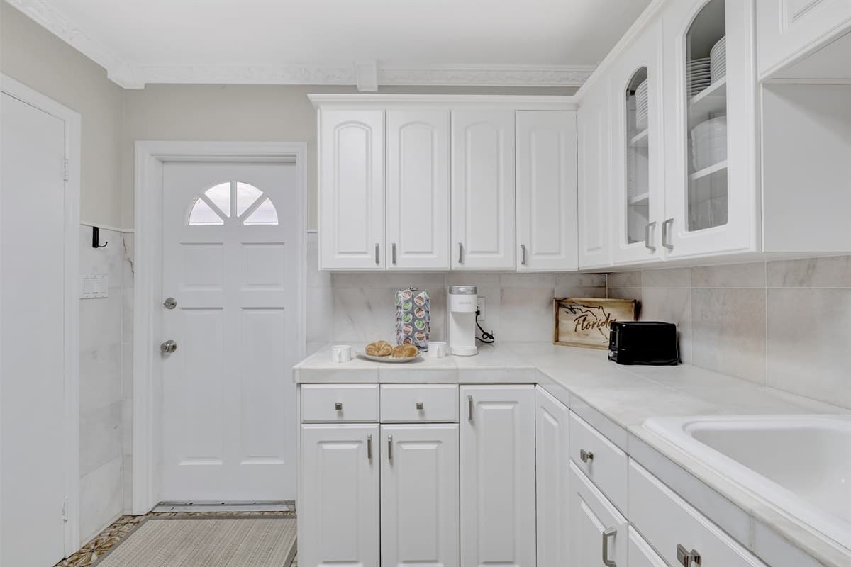 Equipped with gleaming silver appliances, our kitchen is a culinary haven where both form and function unite in perfect harmony.