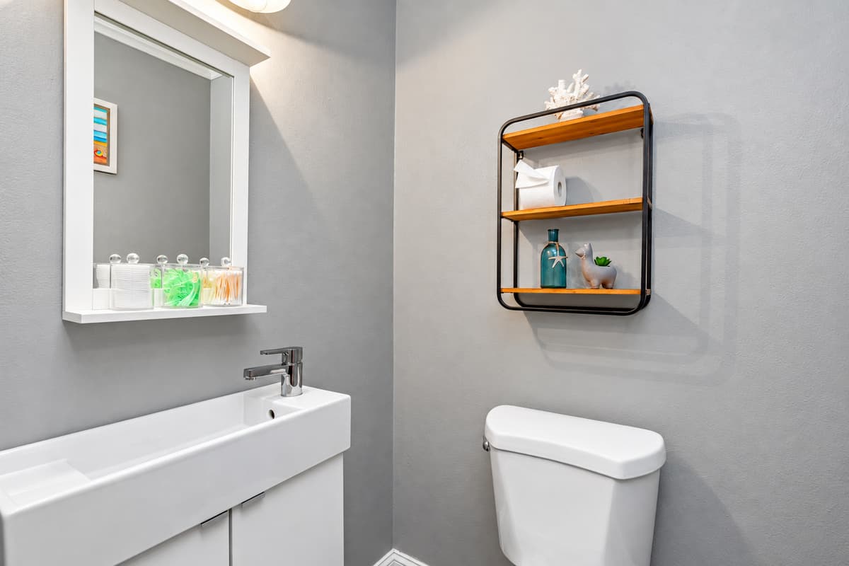 Step into a world of blissful indulgence with our breathtaking half bathroom.