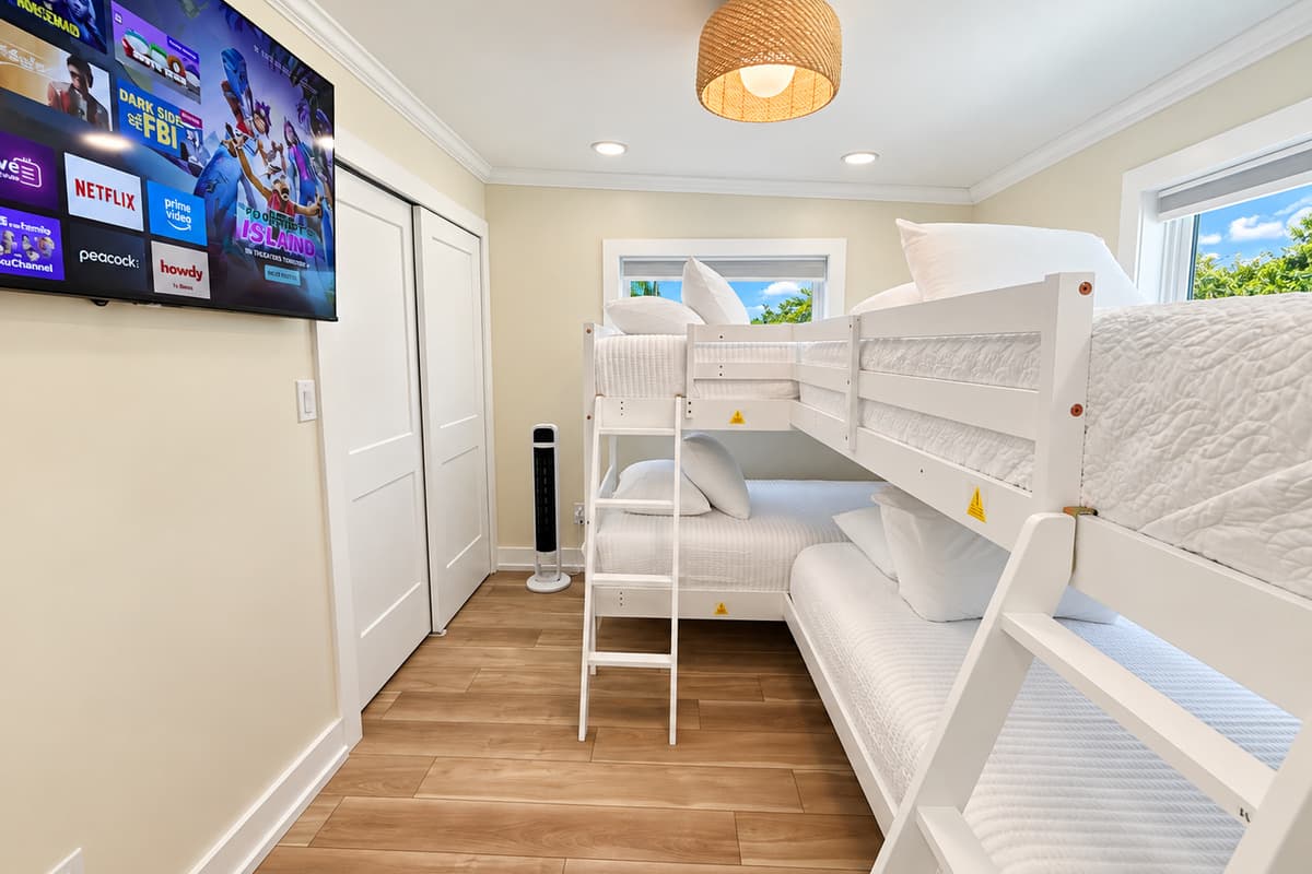 Bunk room with two twin-over-twin bunks: four twin sleeping spaces.
