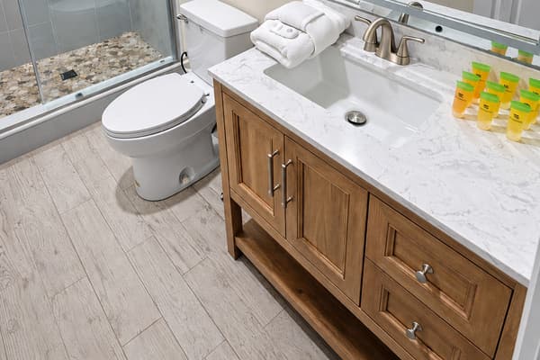 The soothing tones and clean finishes offer a relaxing retreat after a long day.