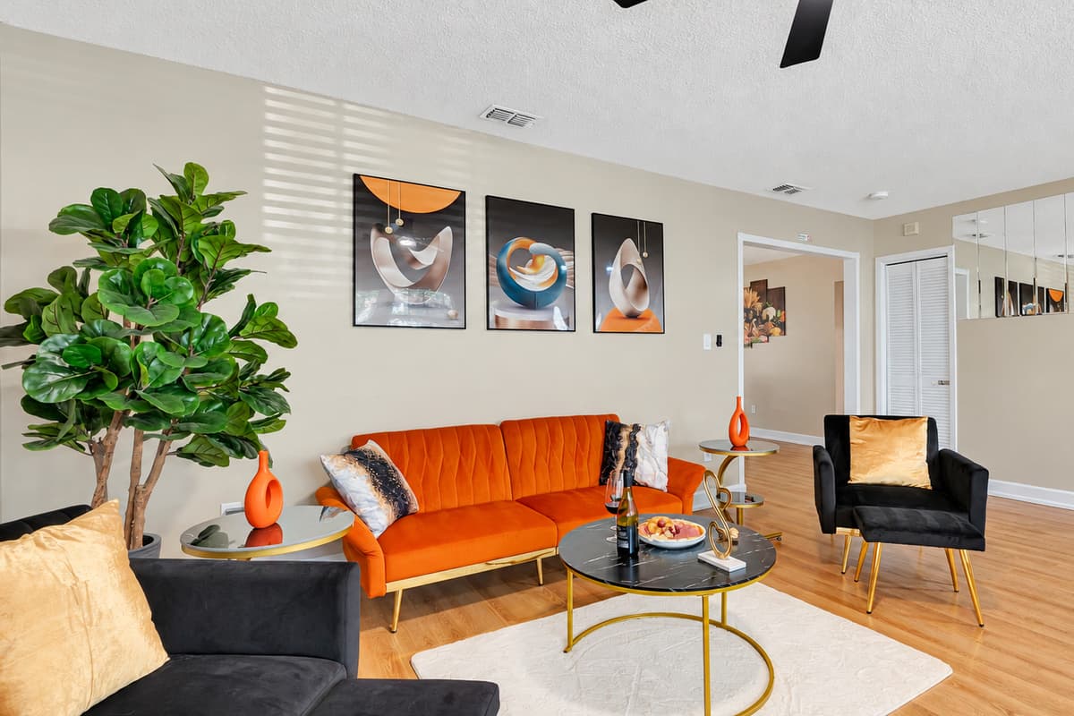 This room boasts an expansive seating arrangement meticulously crafted for both relaxation and socializing.