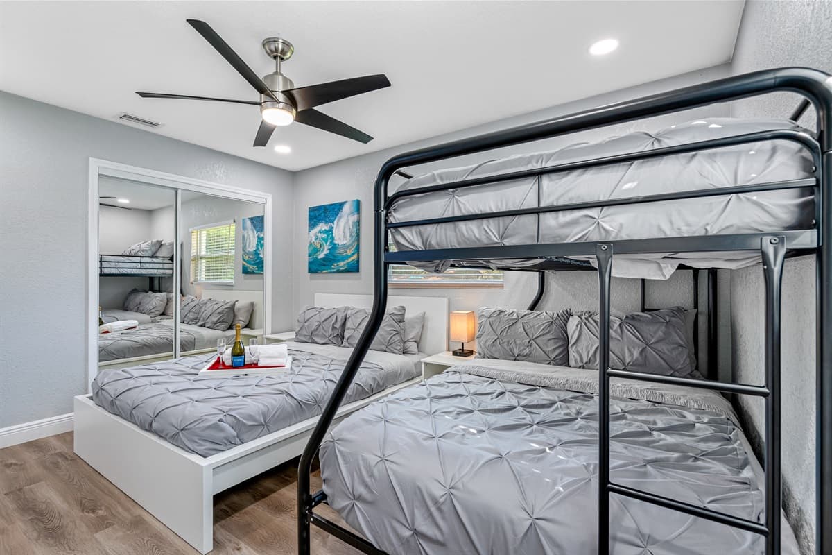 Our wonderful bedroom with a comfortable huge bed, a bunk bed and its own smart TV. Feel at home in your home away from home. If you think you'd enjoy your trip to this property, send us a message now!