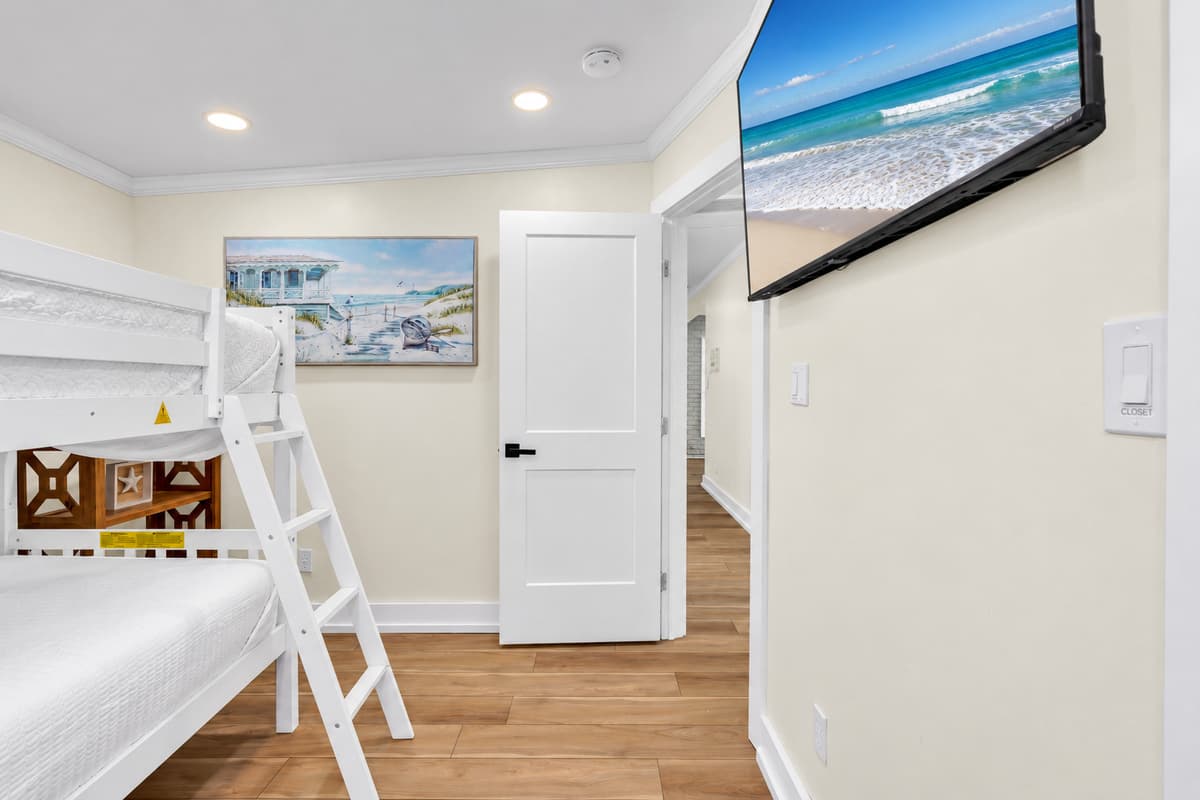 Four beds, one happy kids' room. Twin-over-twin bunks with sturdy ladders and soft linens. Great for siblings, cousins or friends who want to stay up late.