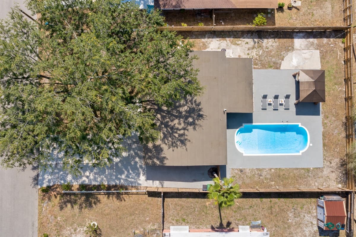 Get ready for a bird's eye view of paradise! Our stunning house and pool are the stars of the show from above