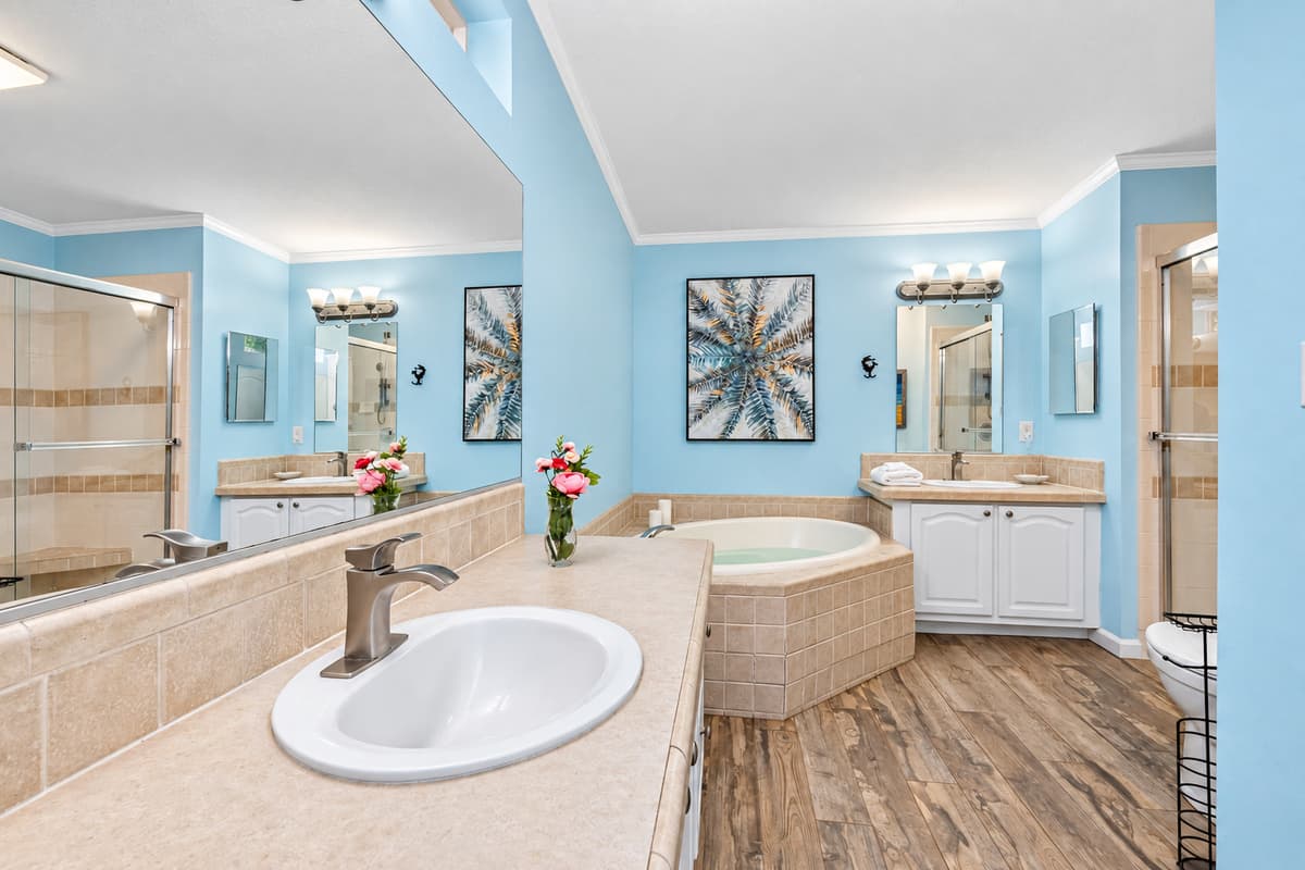 This expansive master ensuite offers a serene, spa-like atmosphere designed for total relaxation.