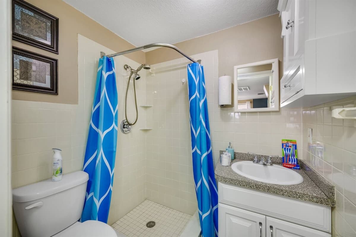 Great bathroom with toilet, sink and walk in shower. Feel fresh and clean after a long day of travel from your home to your home away from home. If you are interested in this property, send us an inquiry now!