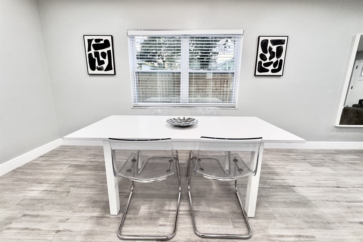 The dining table comfortably seats up to 4 guests, making it the perfect spot to enjoy breakfast, lunch, or dinner with your travel companions.