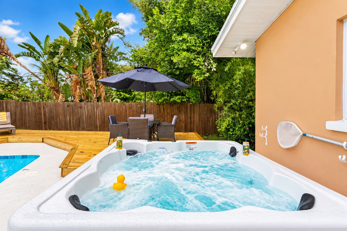 Vacation mode: activated. Lounge by the pool, soak in the spa, or sip something cool beneath the palms.