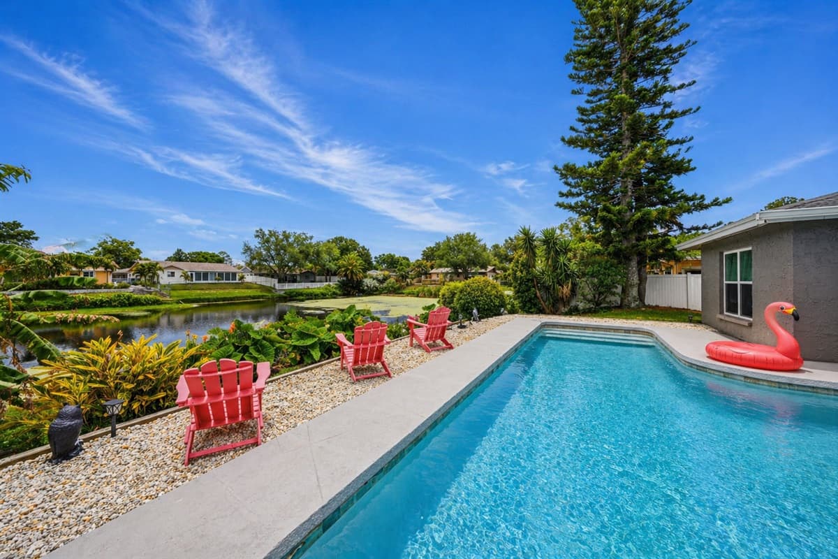 Scenic poolside views with lush greenery and peaceful surroundings.