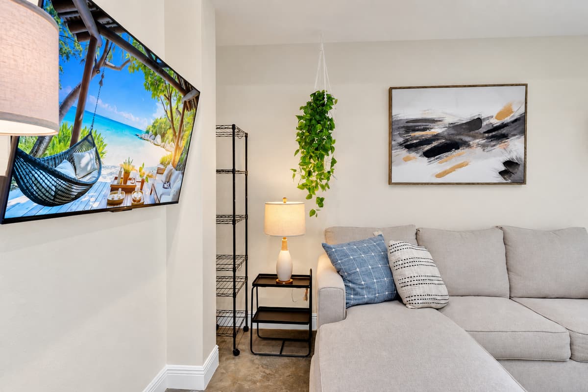 Your own living room, inside the bigger house. A second lounge with its own screen and sofa, so the early risers, the movie crowd and the people who want silence never have to negotiate a single evening.