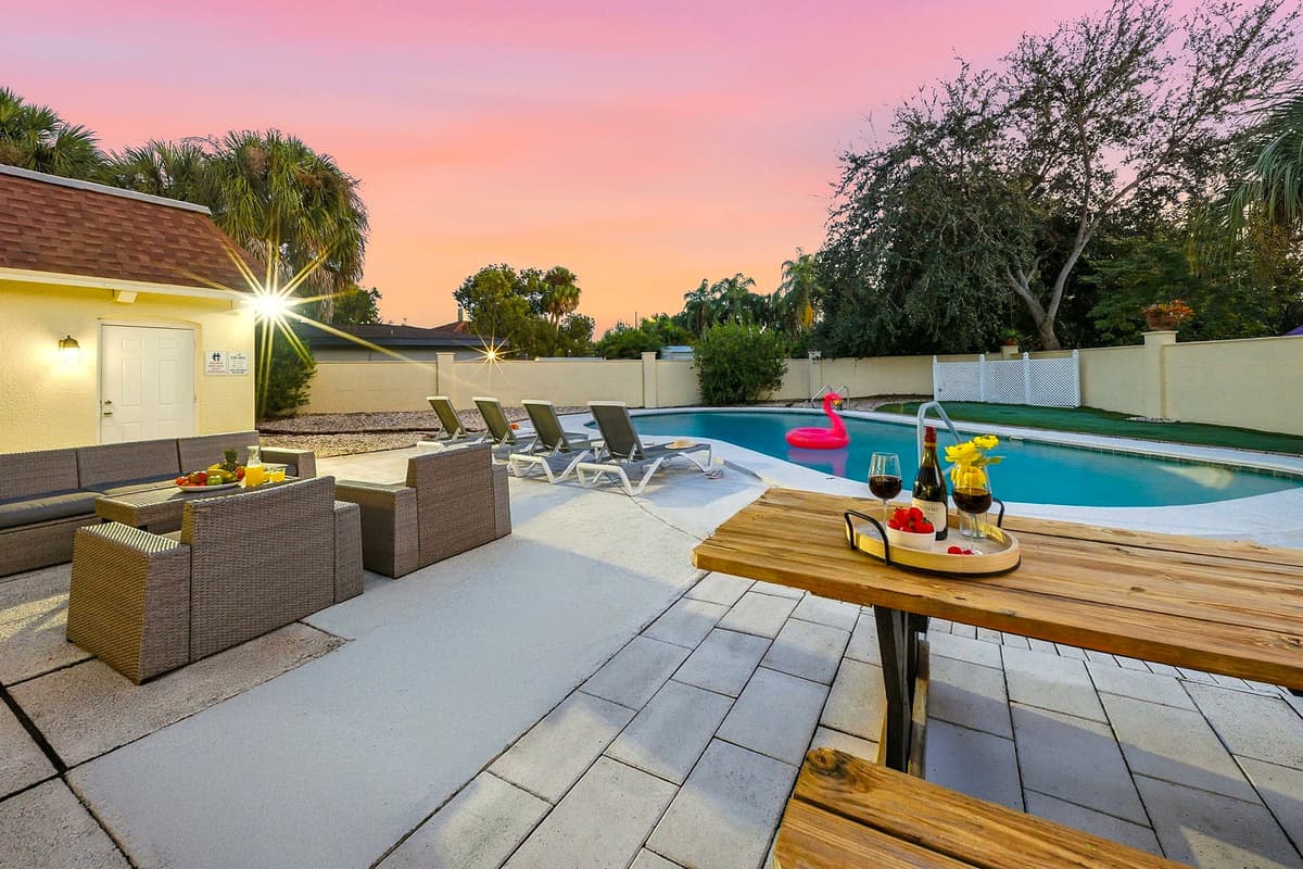 Enjoy the ultimate outdoor experience with a private pool, cozy lounge seating, and a picnic-style dining area perfect for sharing meals outdoors.