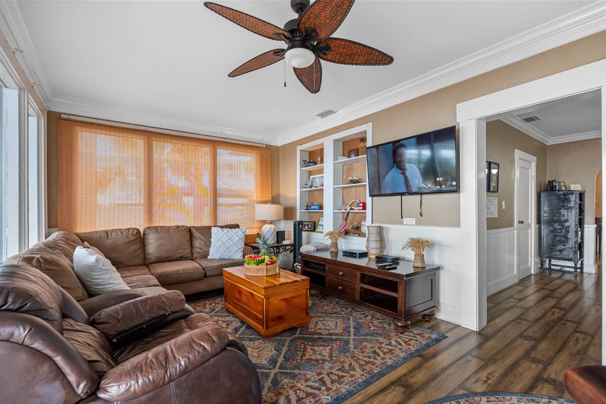 The living room serves as the heart of this home, offering a warm and welcoming space where comfort and relaxation come together.