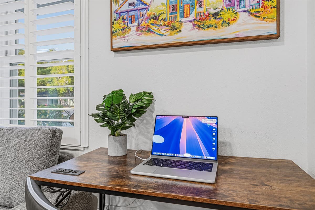 Dedicated workspace with desk and seating—perfect for remote work or planning your day 💻