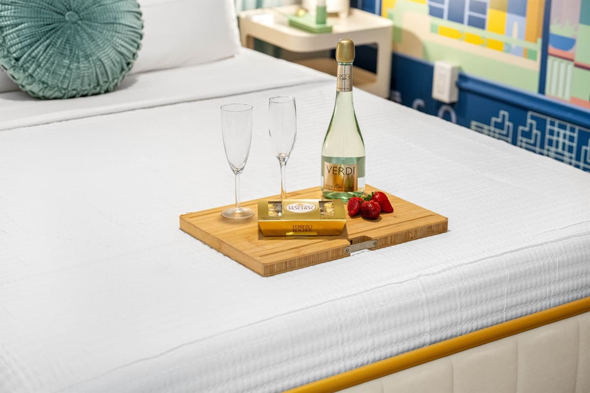 This beautifully designed retreat offers a queen-size bed dressed in premium linens, ensuring ultimate comfort and relaxation.