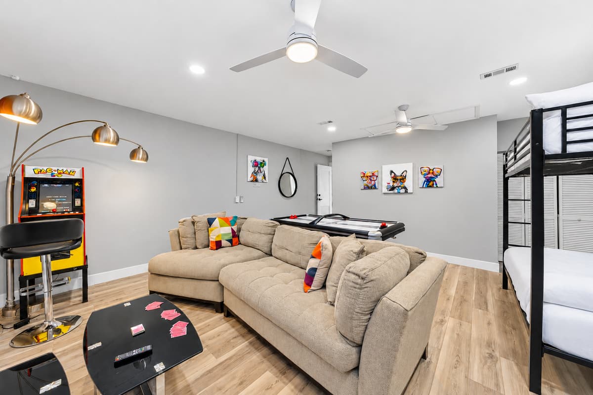 Challenge your group to air hockey before relaxing on the oversized sectional sofa.